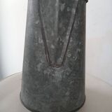 Bent zinc garden pitcher