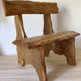 Brutalist low chair in solid wood