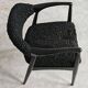 Pair of Mid Century Modern armchairs in astrakhan leather.