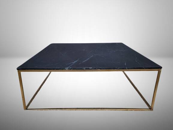 Coffee table or black marble and brass display "in its own juice"