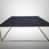Coffee table or black marble and brass display "in its own juice"