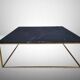 Table basse en marbre noir et laiton