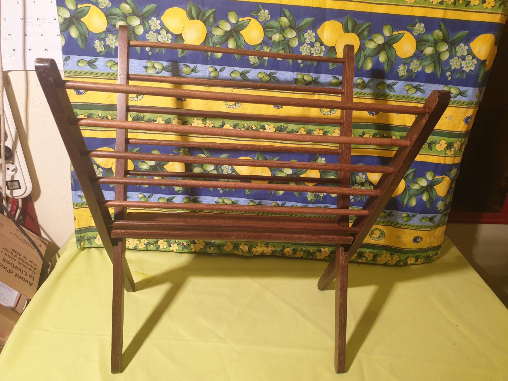 Scandinavian wooden folding magazine rack