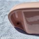 Vintage pink ceramic bathroom shelf