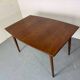 Table de salle à manger extensible en teck, style danois vintage des années 1950.