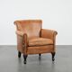 Beautiful subtle vintage sheepskin armchair with elegant legs