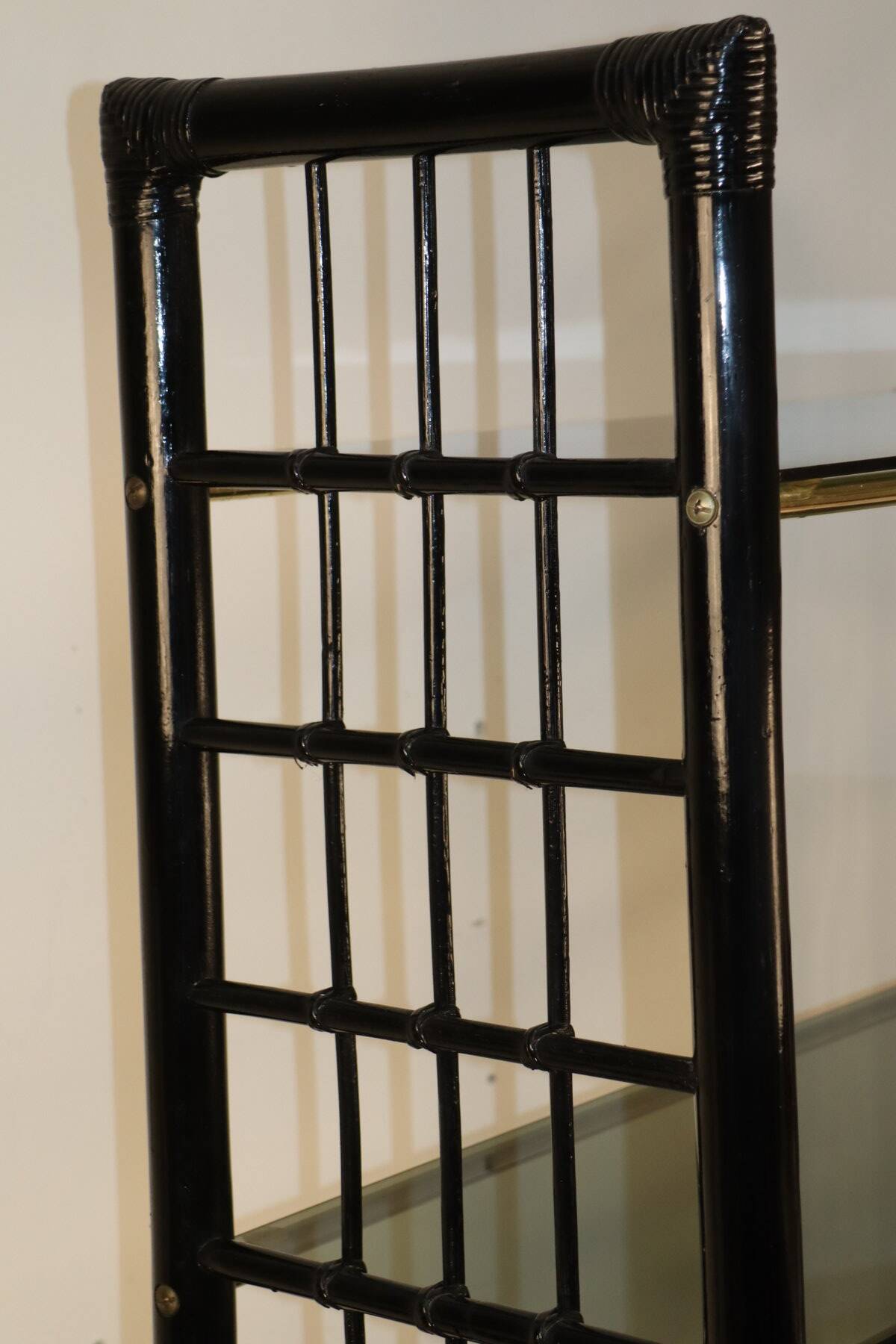Vintage 1970s shelf in smoked glass with a bamboo-style structure.