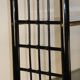 Vintage 1970s shelf in smoked glass with a bamboo-style structure.