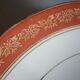Plate and limoges porcelain dish with orange and gold trim