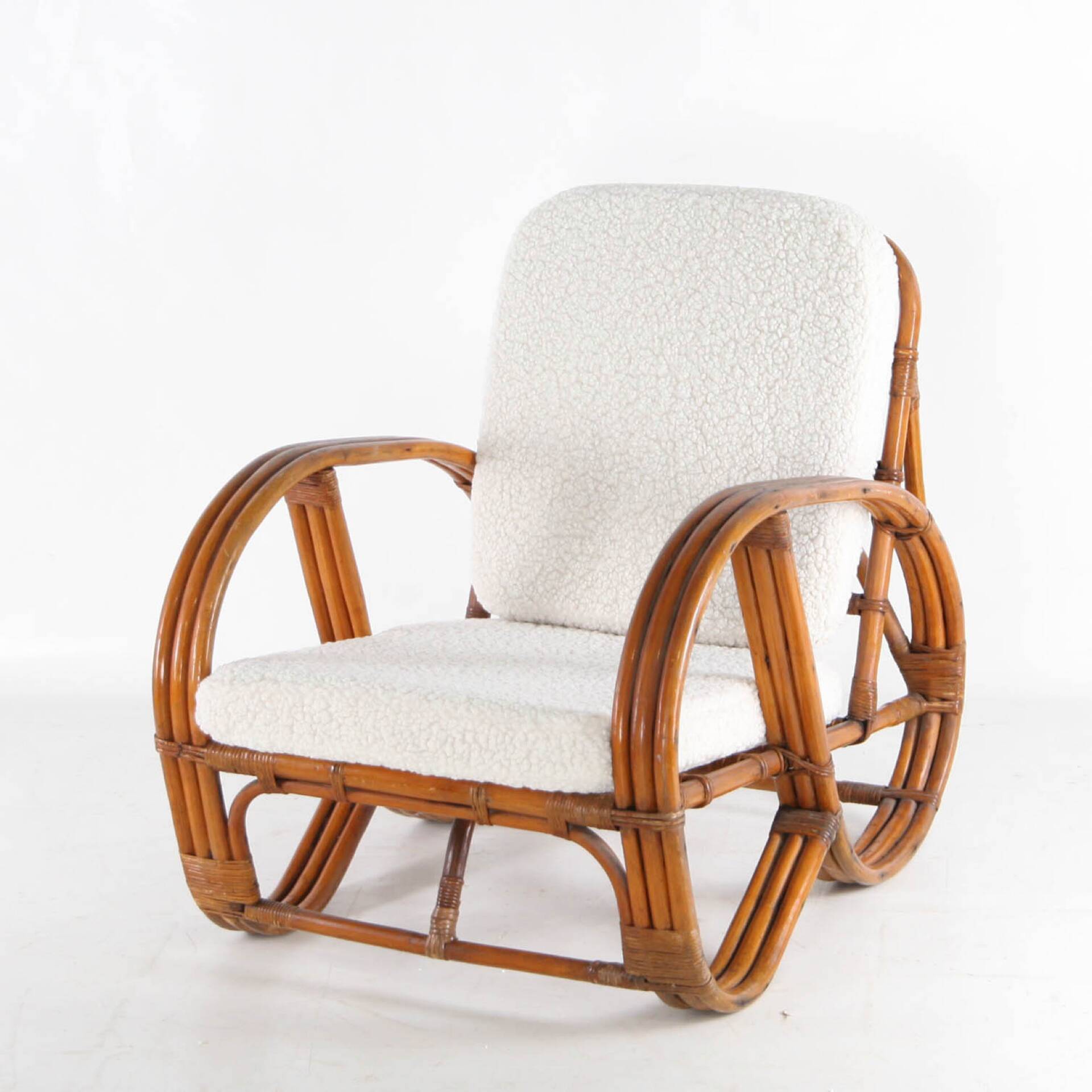 "Bretzel" armchair in rattan