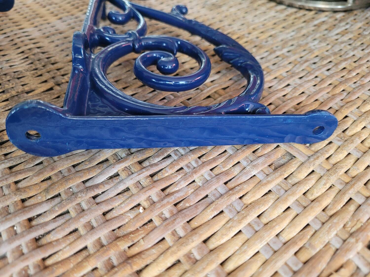 Pair of blue wrought iron shelf brackets