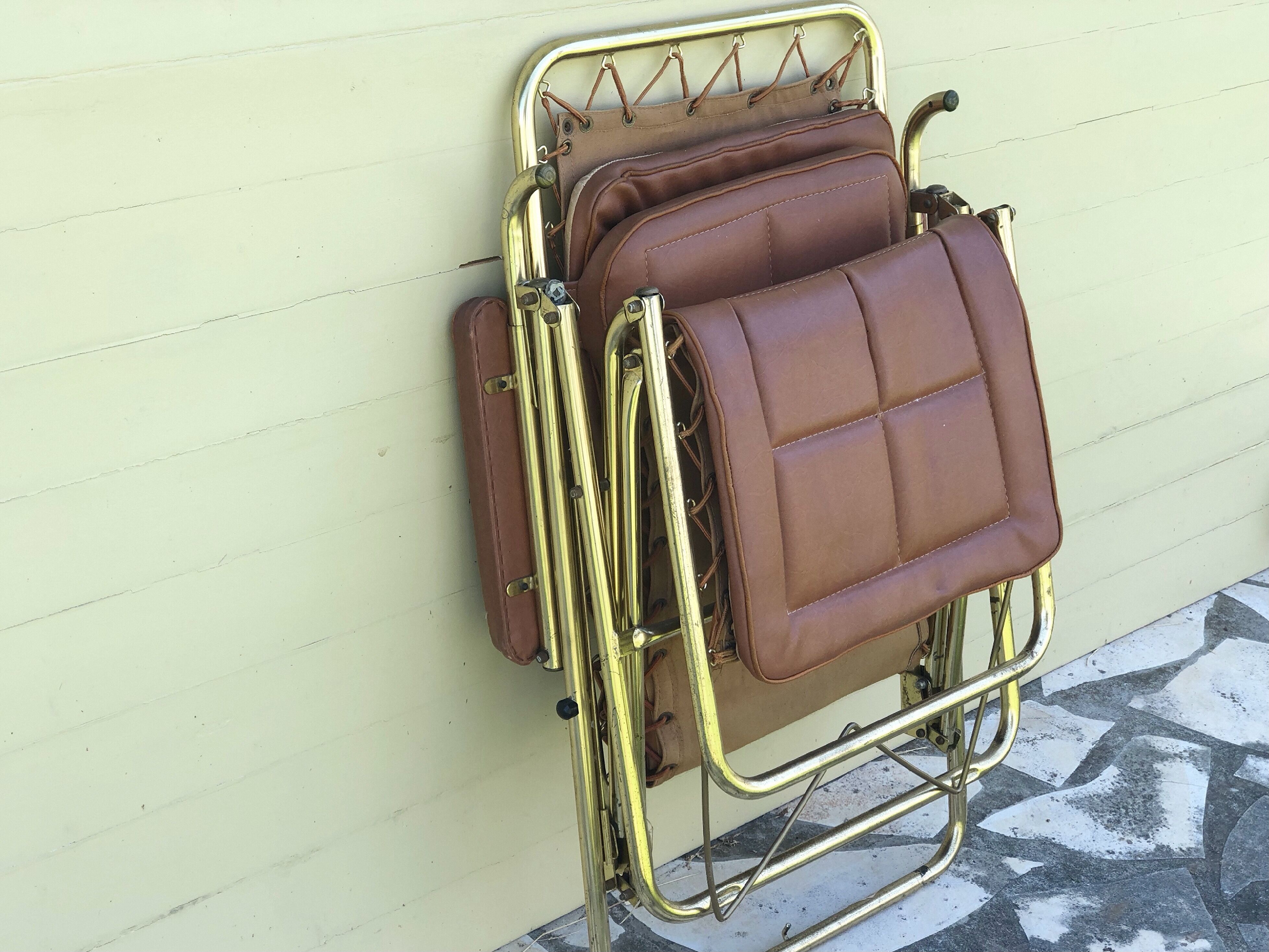 Vintage leather folding deckchair