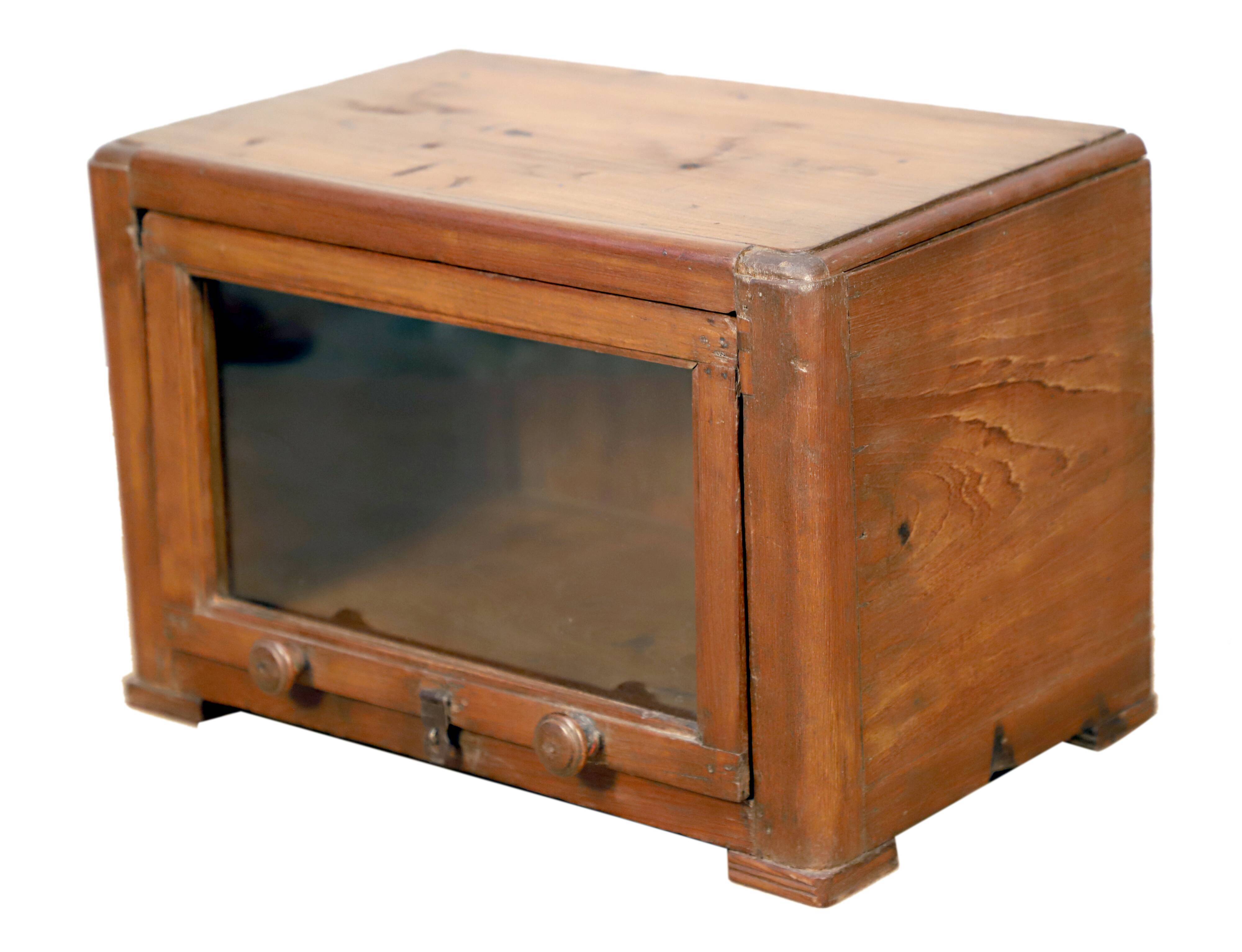 Art Deco showcase in Burmese teak