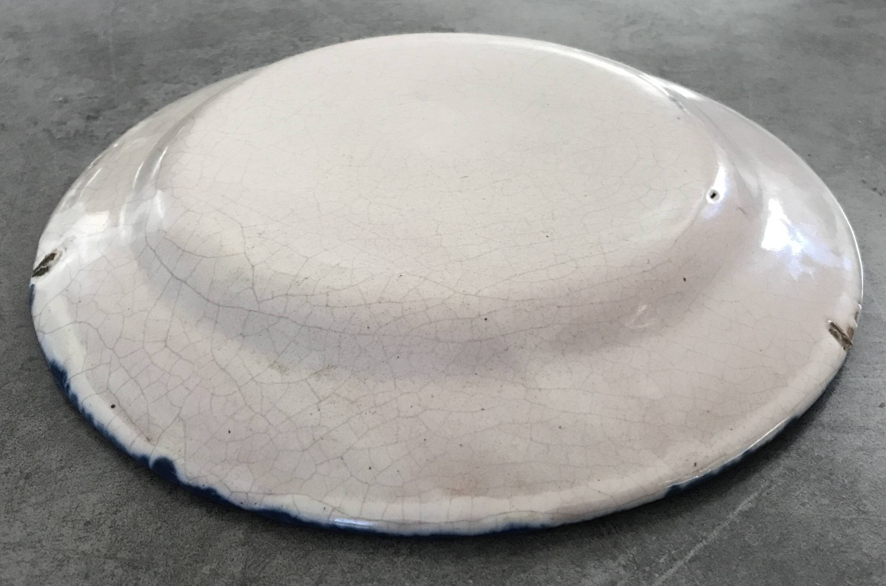 Old plate in auvillar earthenware, floral painting decoration, 19th century