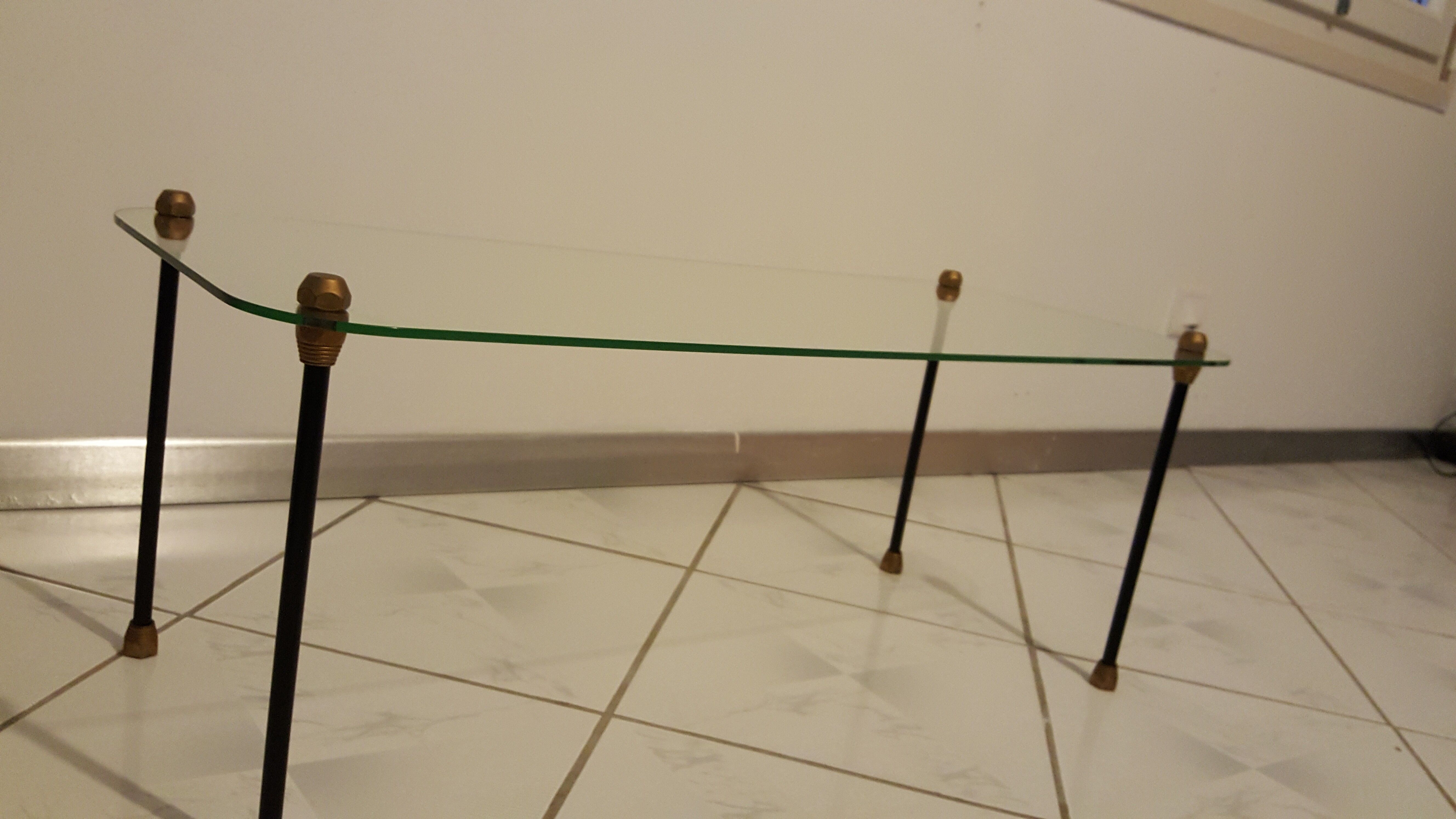 Glass table with brass tip