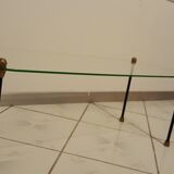 Glass table with brass tip