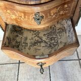 Small curved chest of drawers in Louis XV style