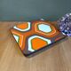 Dessous de plat orange marron et blanc formica vintage