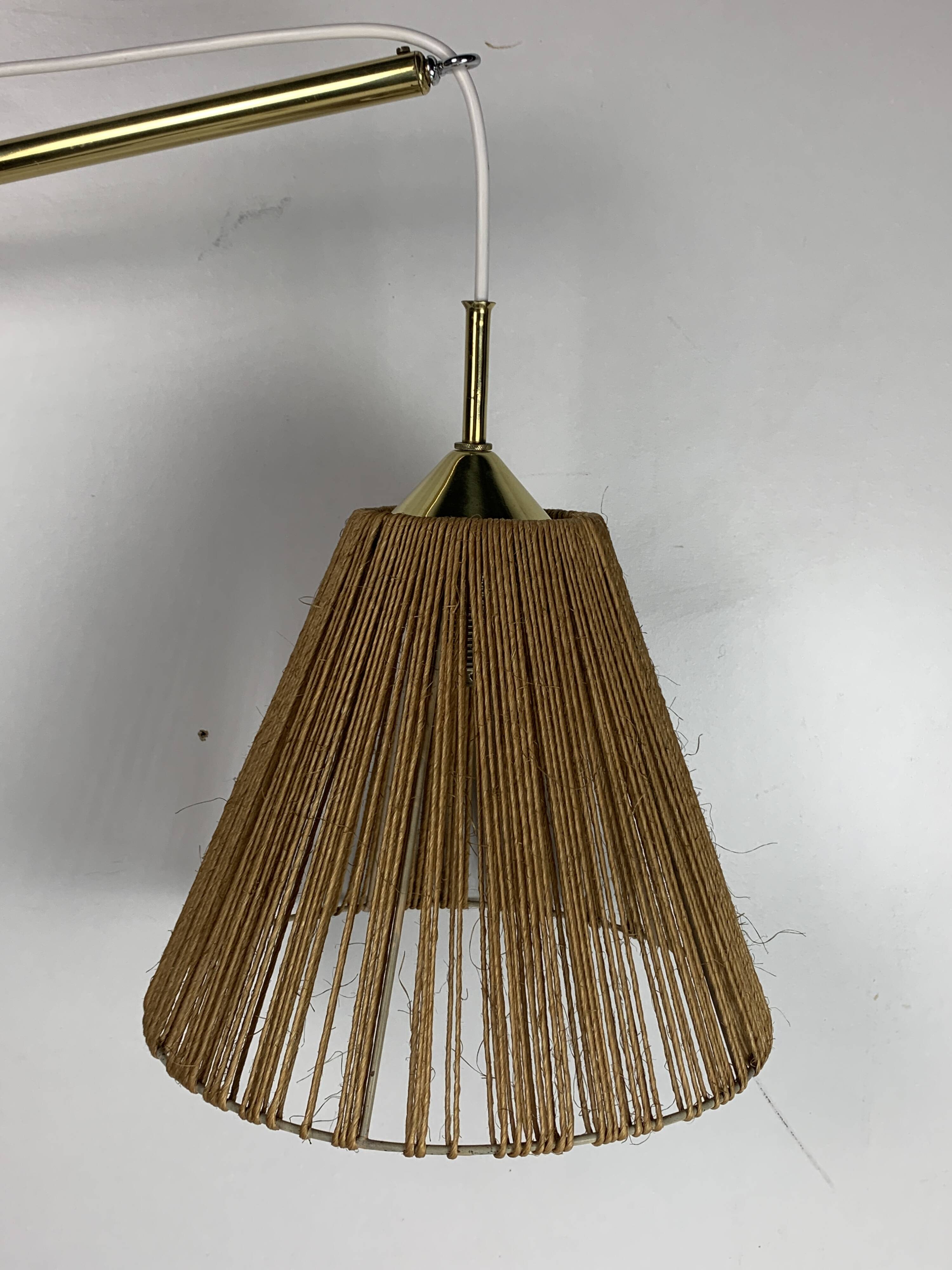 Midcentury extendable brass wall mount with cocoon and sisal shade Lars Schioler, 1960s