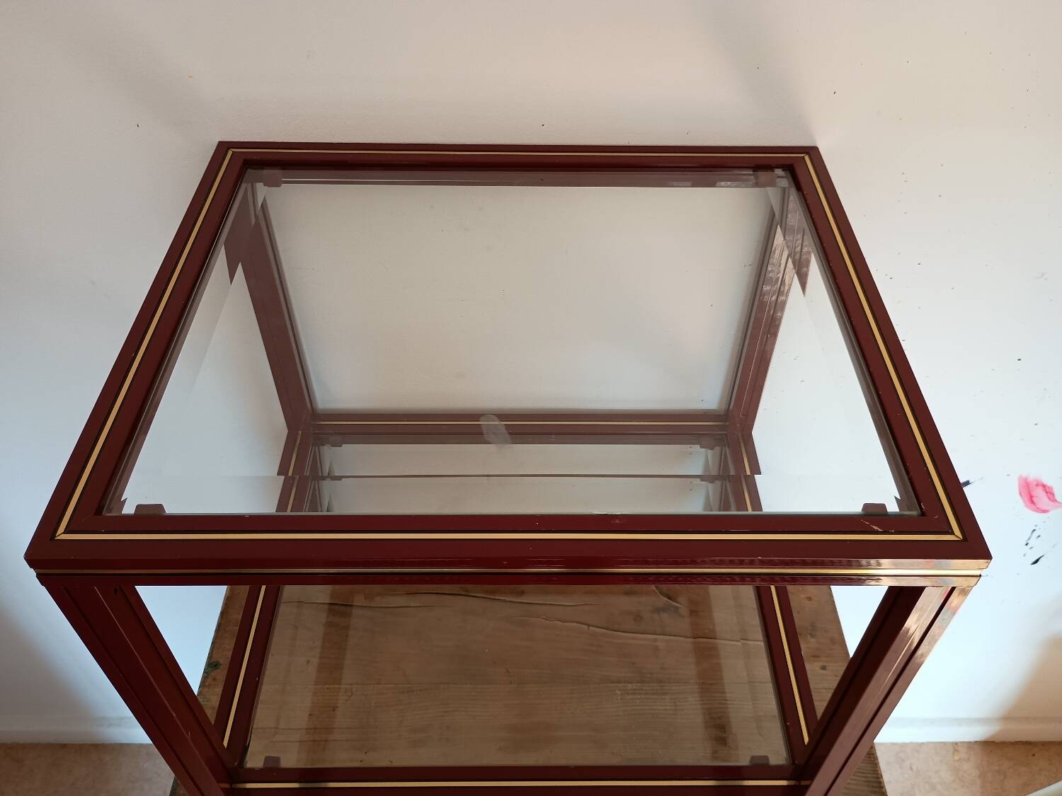 Side table in glass and brass