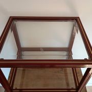 Side table in glass and brass