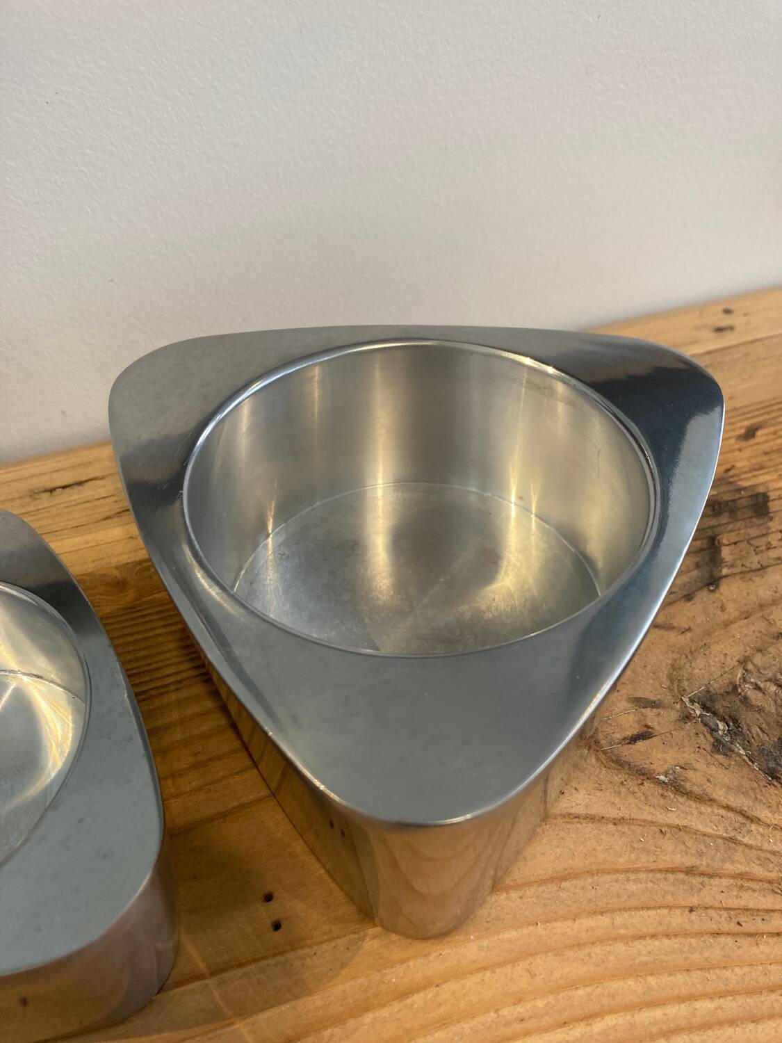 Pair of aluminum candlesticks