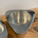 Pair of aluminum candlesticks