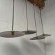 Suspensions in enamelled sheets
