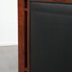 Art Deco design armchair with black leather with decorative stitching