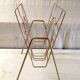 Art Deco style magazine rack in gilt metal - mid-20th century