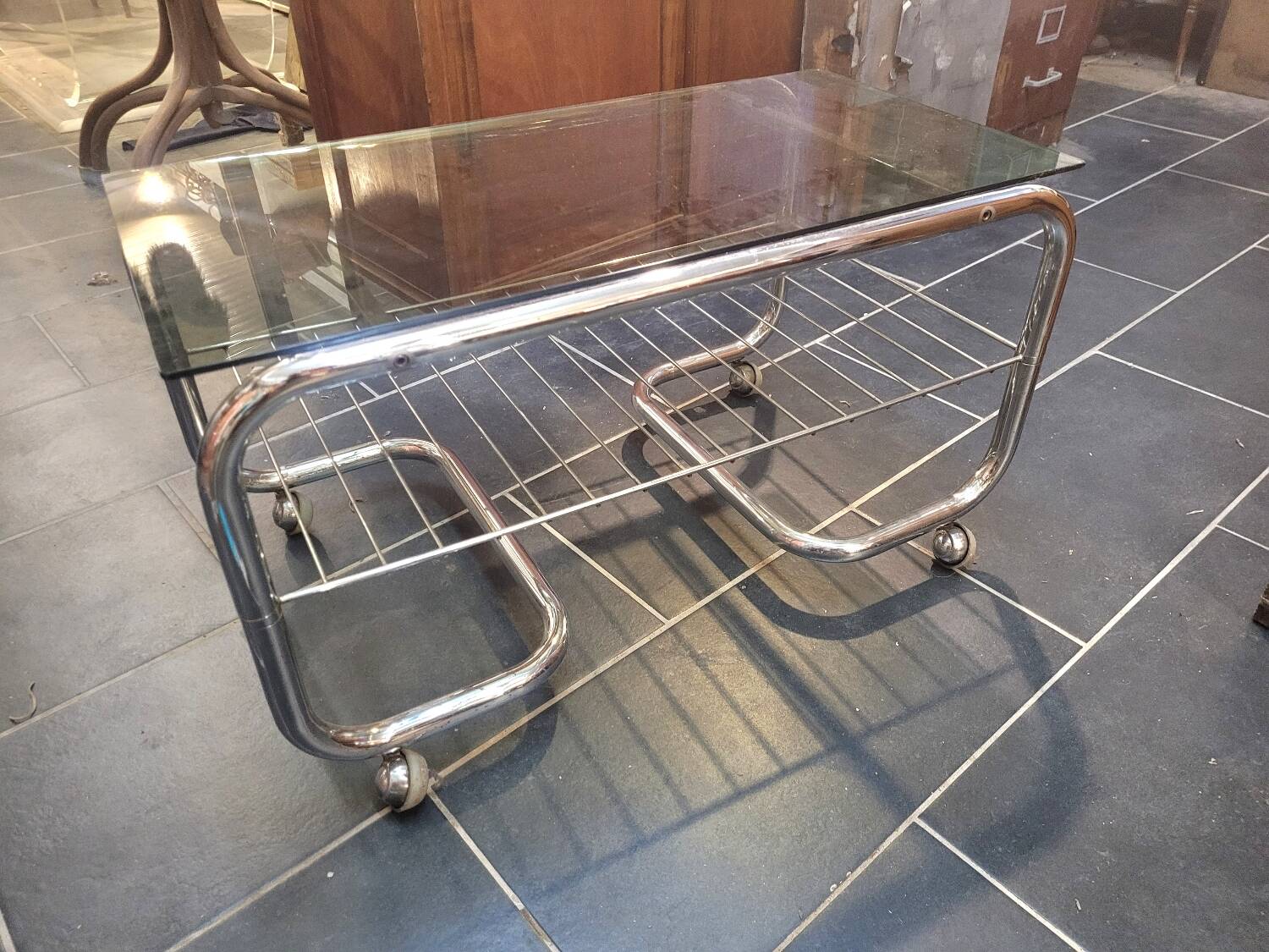 Coffee table with chrome base and smoked glass from the 70s