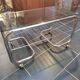 Coffee table with chrome base and smoked glass from the 70s