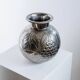 Vintage Italian vase in nickel-plated brass from the 1960s, hand-hammered relief of fruits and leaves.