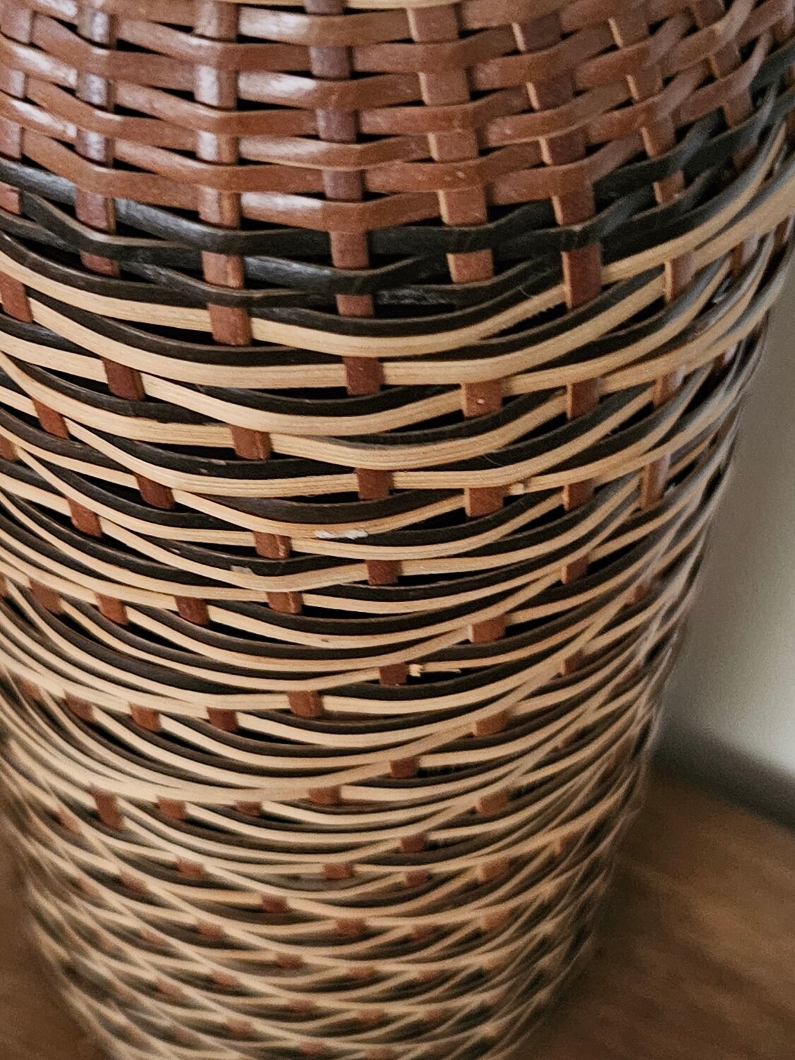 Glass and rattan bottle