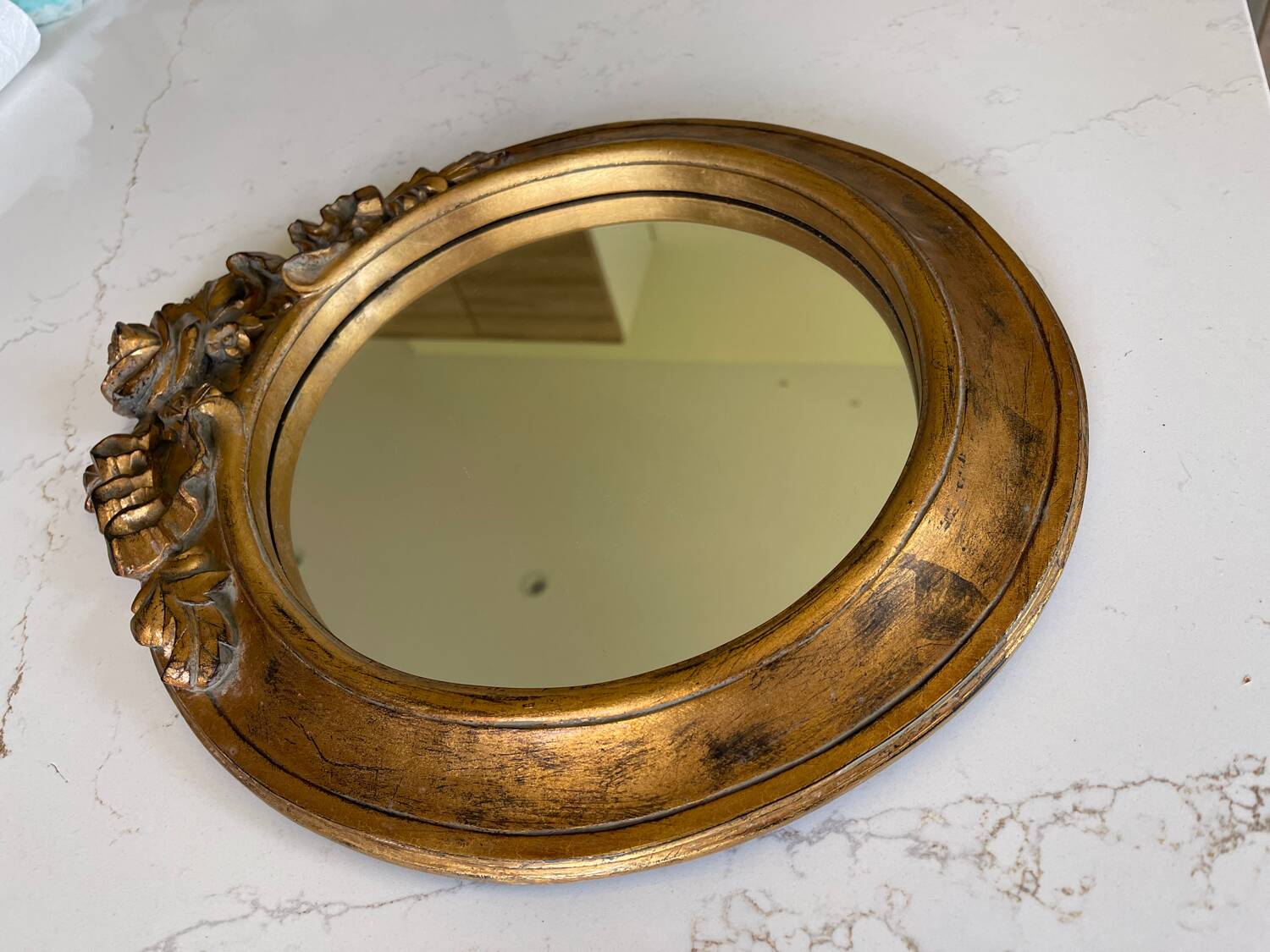 Round carved wooden mirror