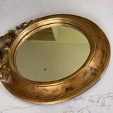 Miroir rond en bois sculpté