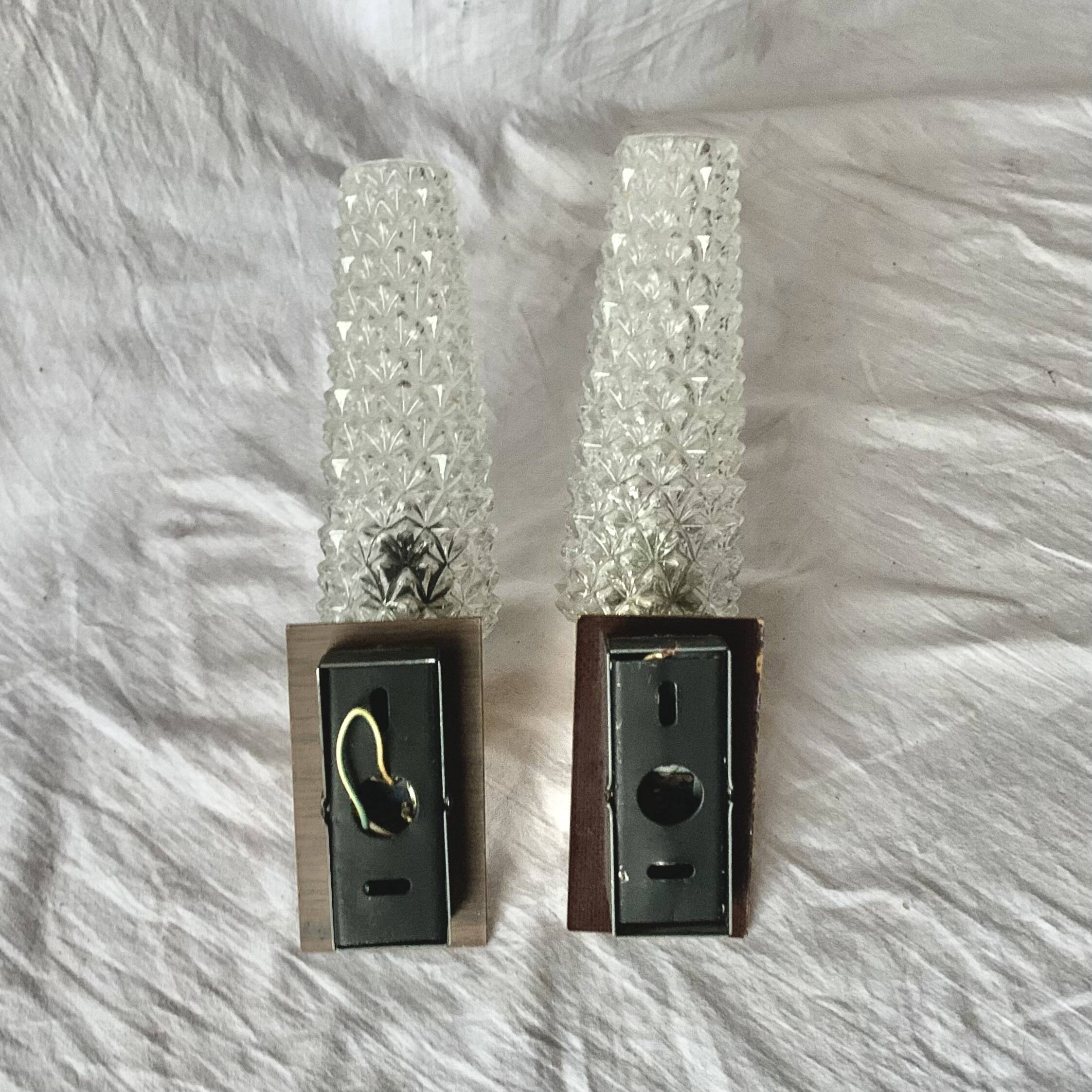 Pair of vintage wall sconces in molded glass and gilded brass