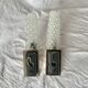 Pair of vintage wall sconces in molded glass and gilded brass