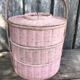 Old vintage pink rattan worker basket