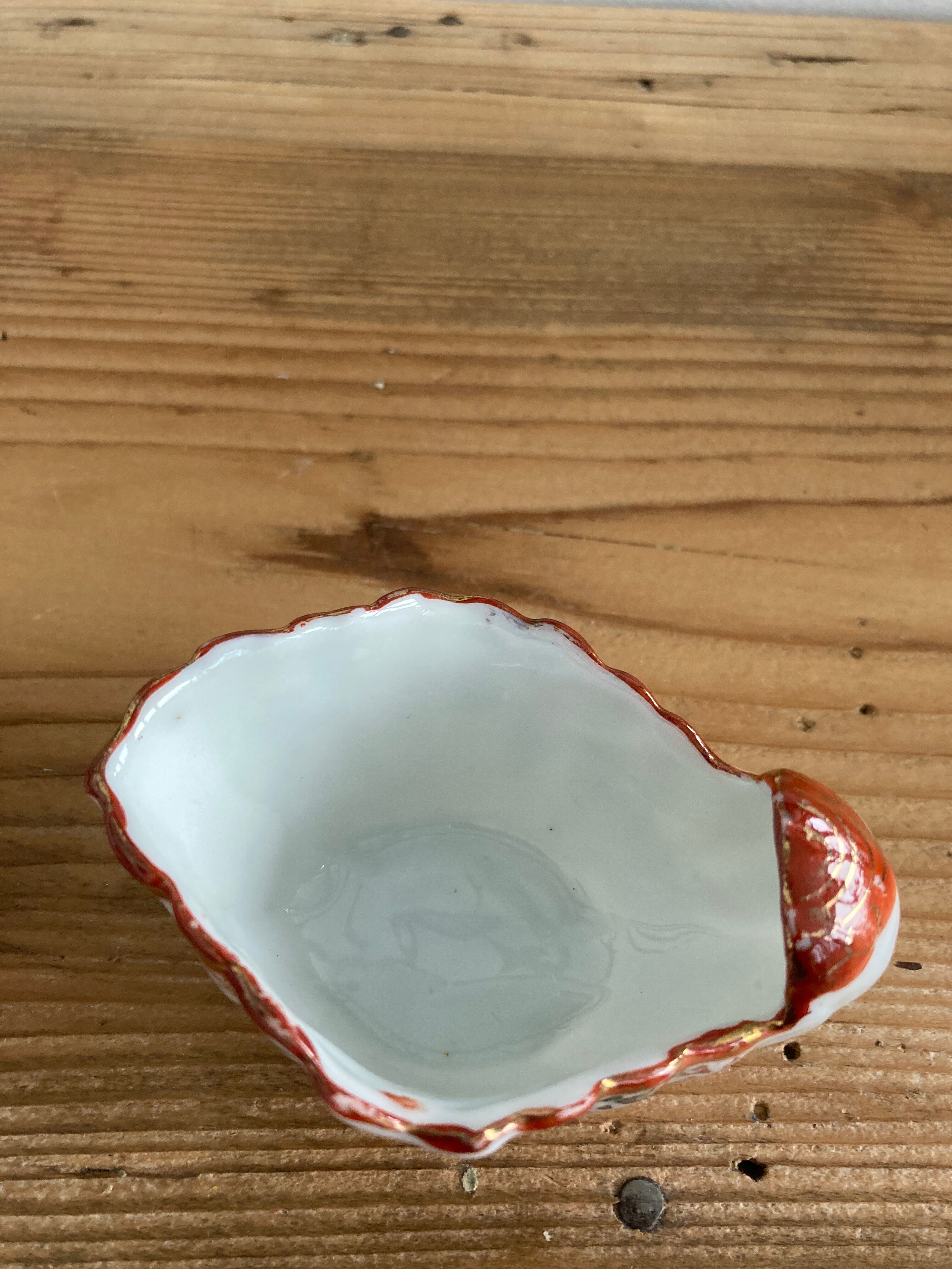 Pair of salerons shell Louis XV style porcelain of the nineteenth