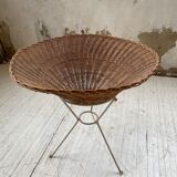 Wicker garden basket on tripod support