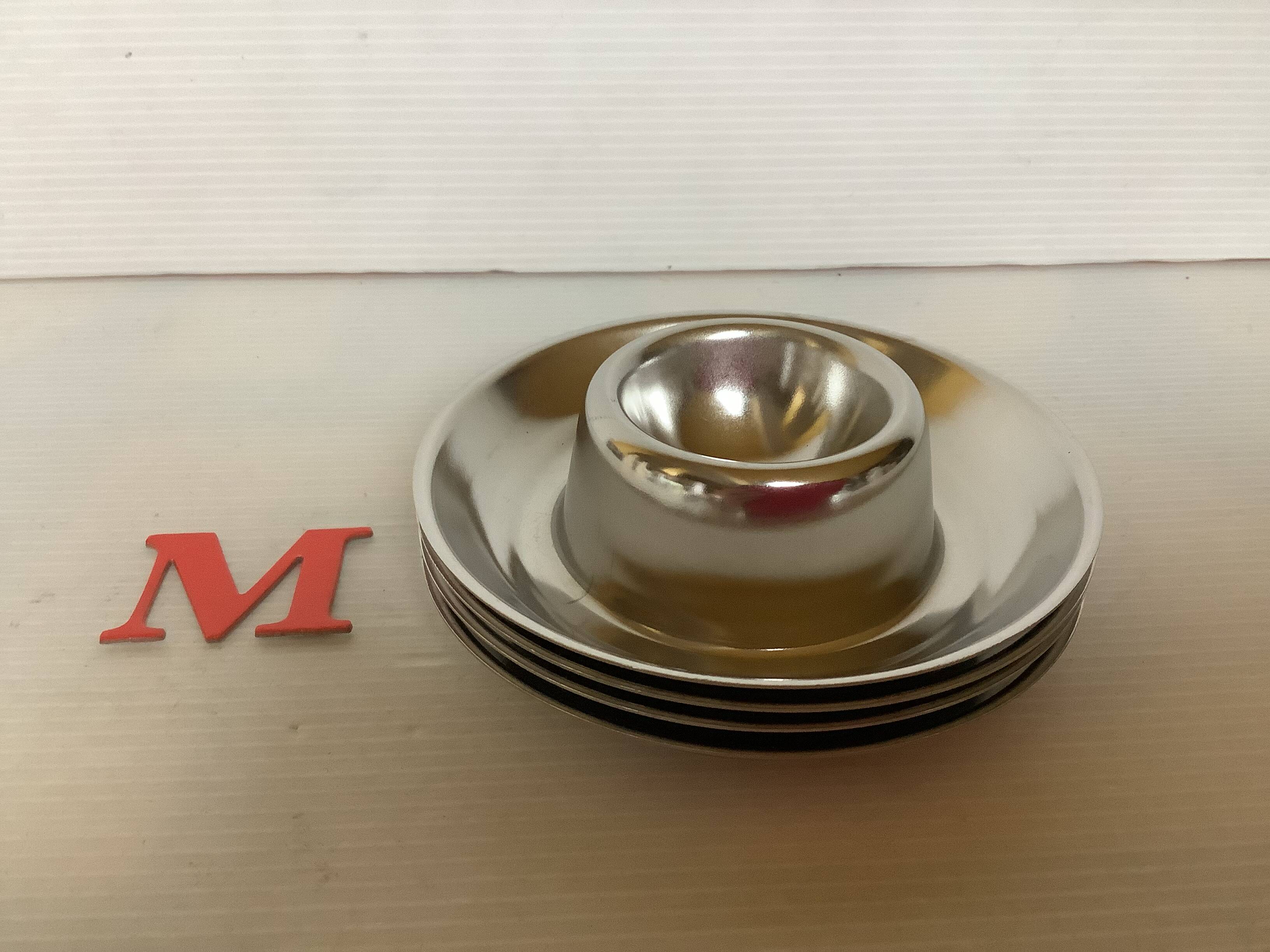 Four Belgium M stainless steel egg cups