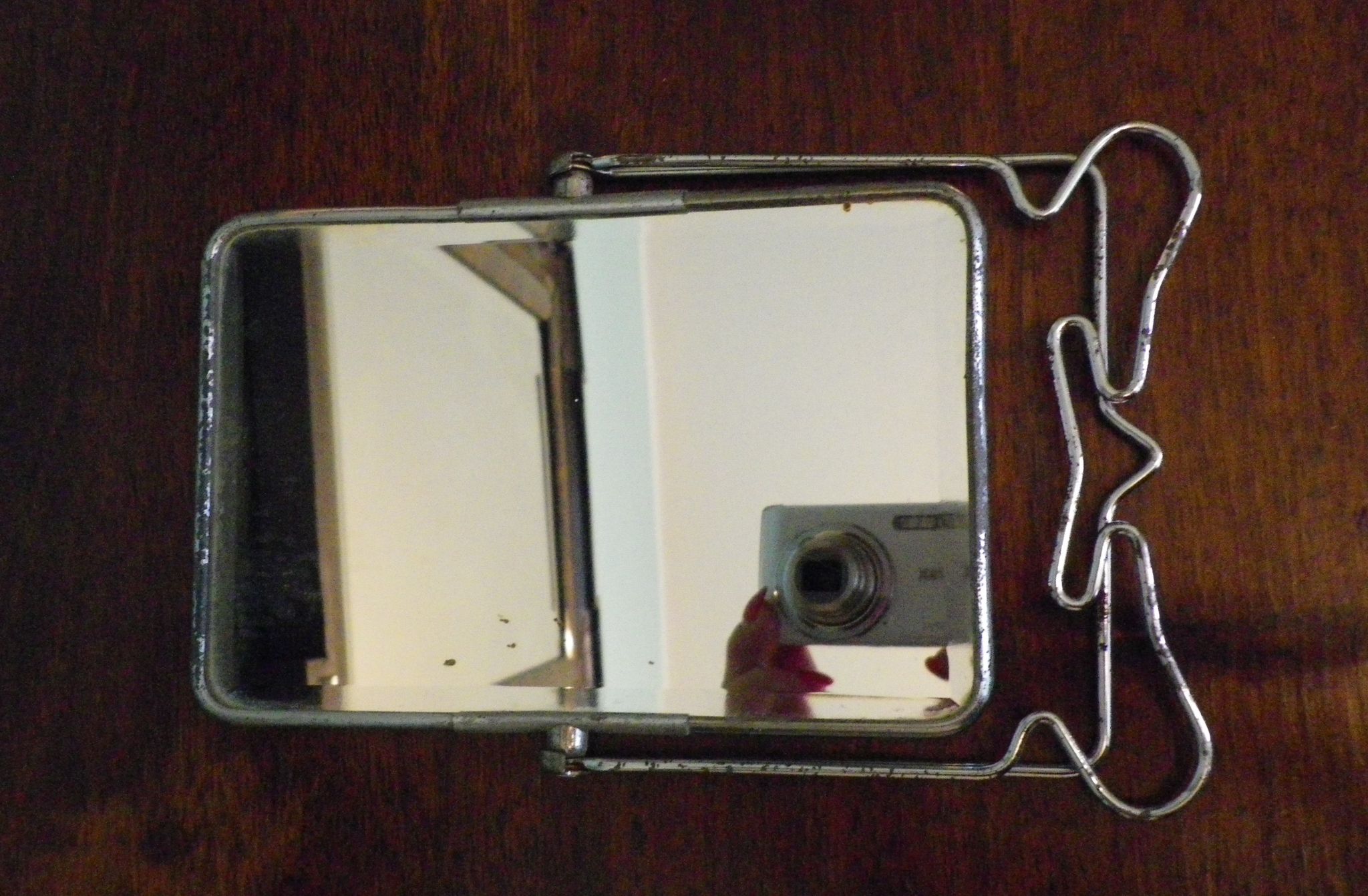 Two-foot barber mirror, suspension mode, beveled, chrome metal - 70s -