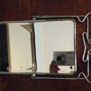 Two-foot barber mirror, suspension mode, beveled, chrome metal - 70s -
