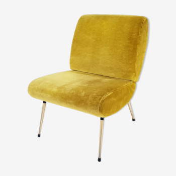 Mustard armchair by Pelfran