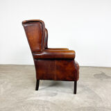 Vintage sheep leather wingback armchair Goor