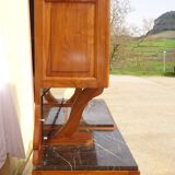 Solid walnut sideboard, moustache legs, black marble top.