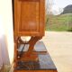 Solid walnut sideboard, moustache legs, black marble top.