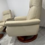 Pair of vintage leather armchairs with ottoman