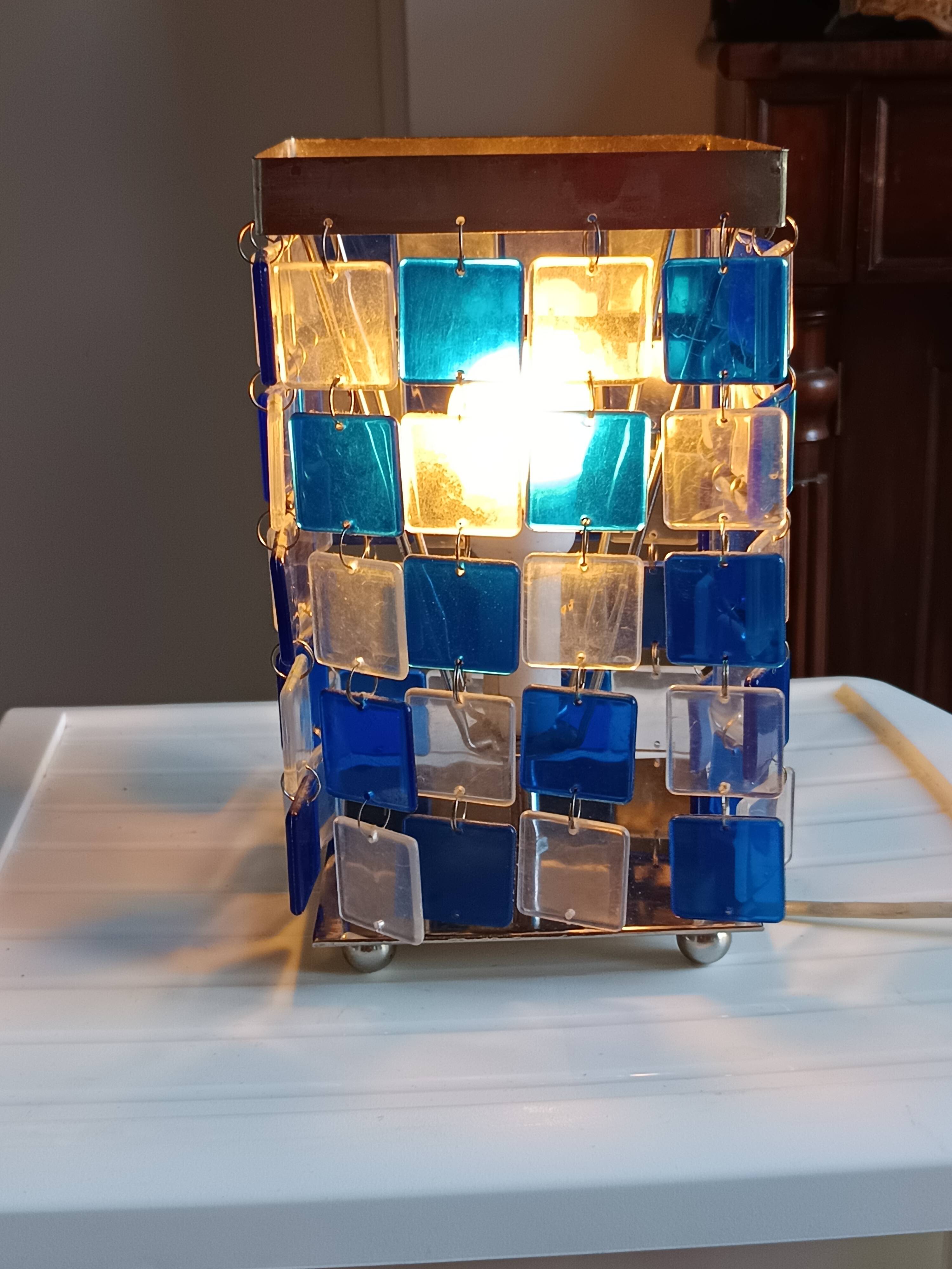1970s designer table lamp with blue and clear plexiglass pendants.